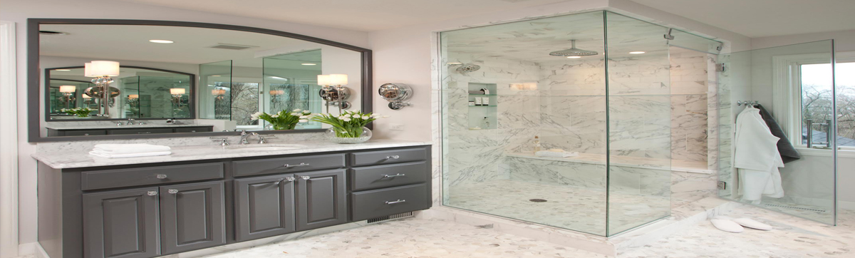 Custom bathroom glass installation by Design Glass & Mirror