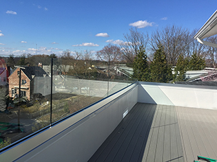 Deck glass railing system by Design Glass & Mirror