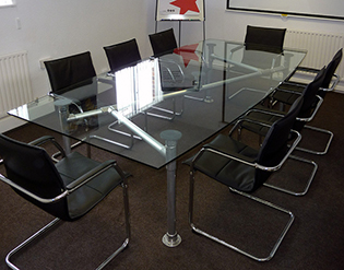 Custom glass conference table top by Design Glass & Mirror