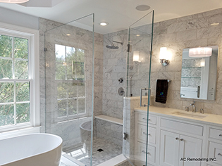 Custom frameless shower enclosure installation by Design Glass & Mirror - example 10