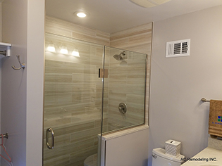 Custom frameless shower enclosure installation by Design Glass & Mirror - example 8